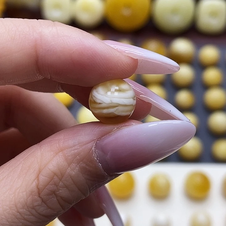 琥珀未镶嵌裸石10.4mm微瑕