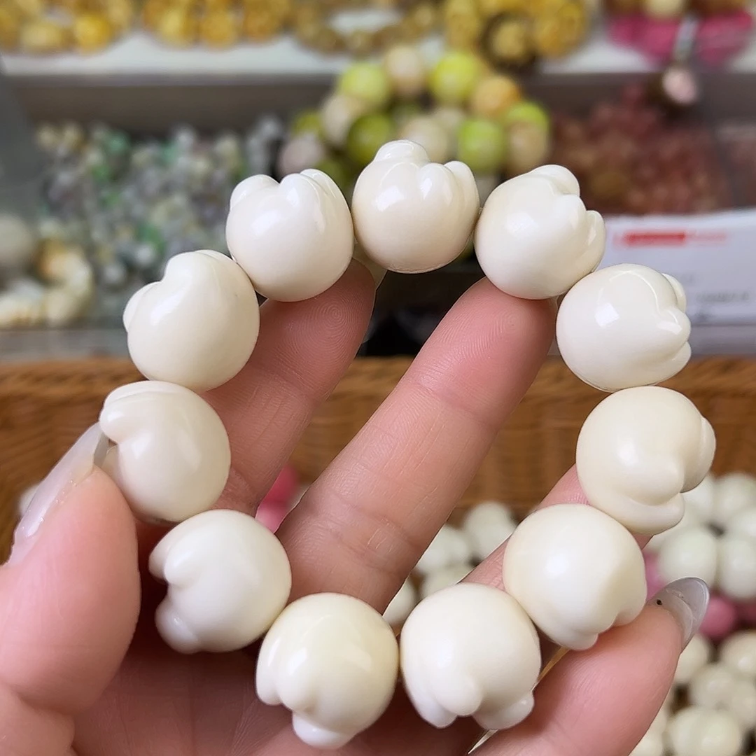 菩提根/象牙果吊坠瑕疵21左右白爱心猫爪11颗孔道有裂