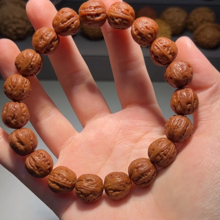 o***o文玩核桃把件红豆手串677