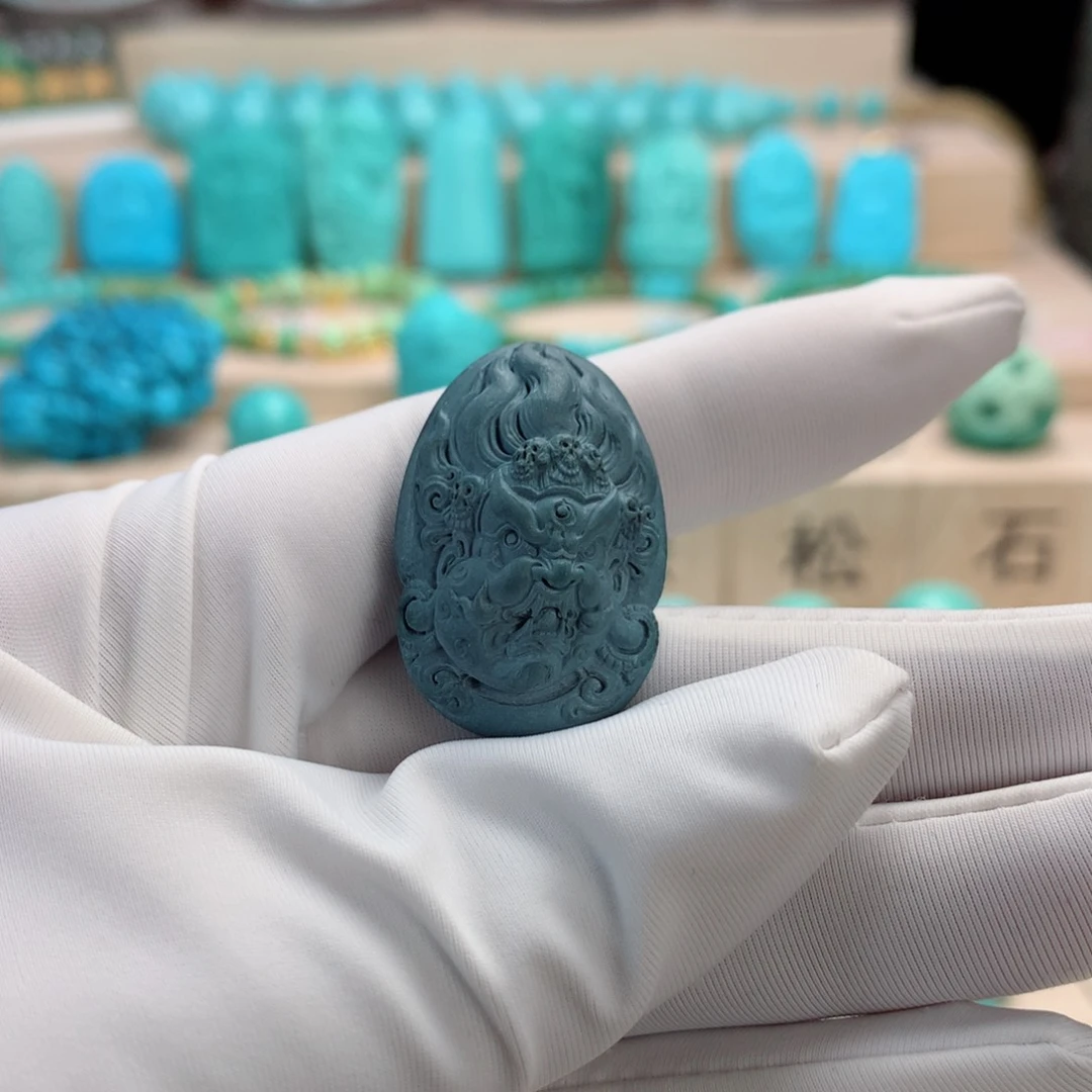 绿松石挂件未镶嵌走****了