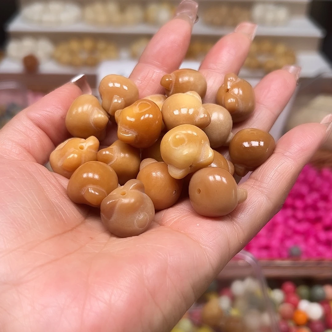 菩提根/象牙果手串瑕疵风化色熊头20颗有裂