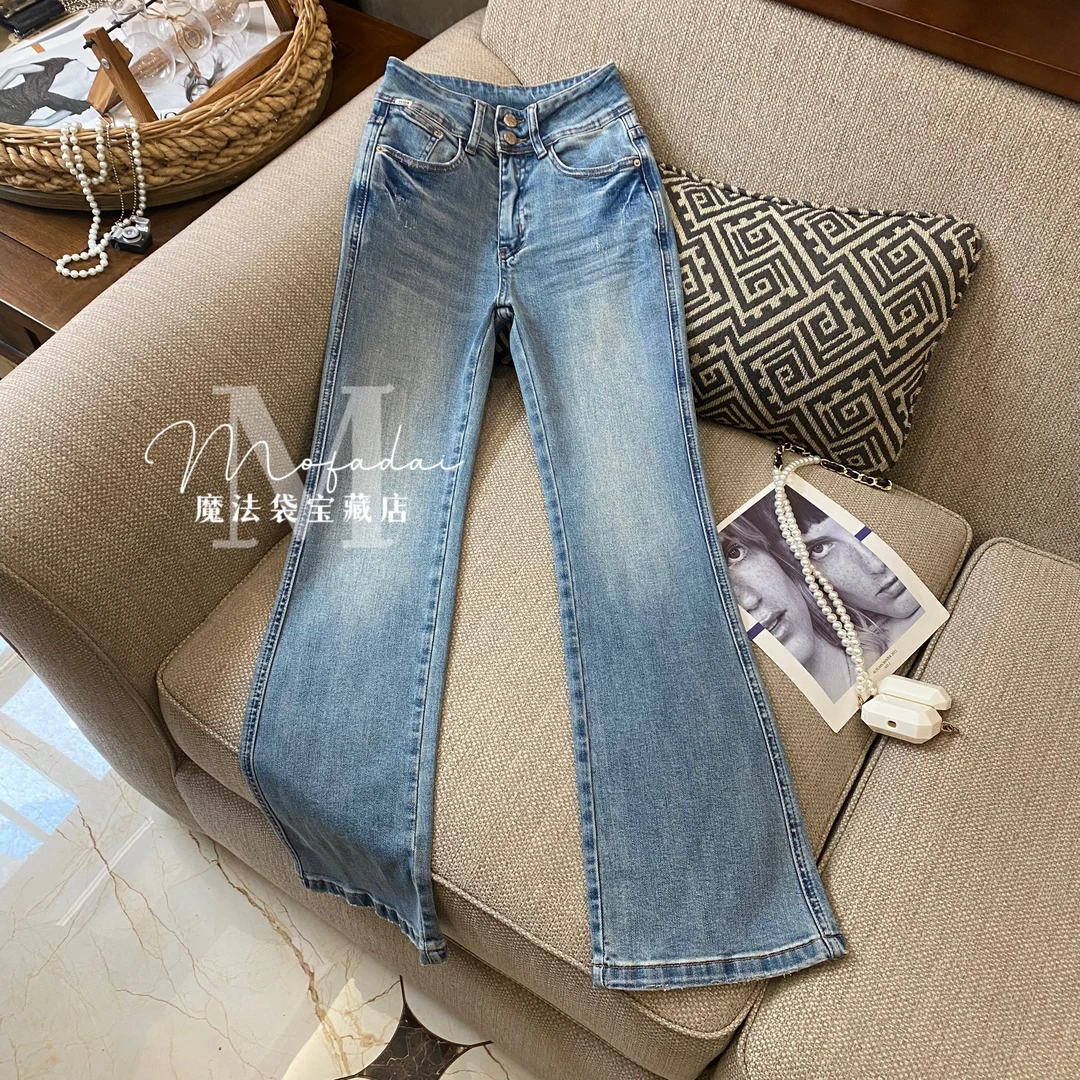 【魔法袋】蓝色春季新款牛仔裤女弹力双颗扣皮标窄版修身显瘦喇叭裤