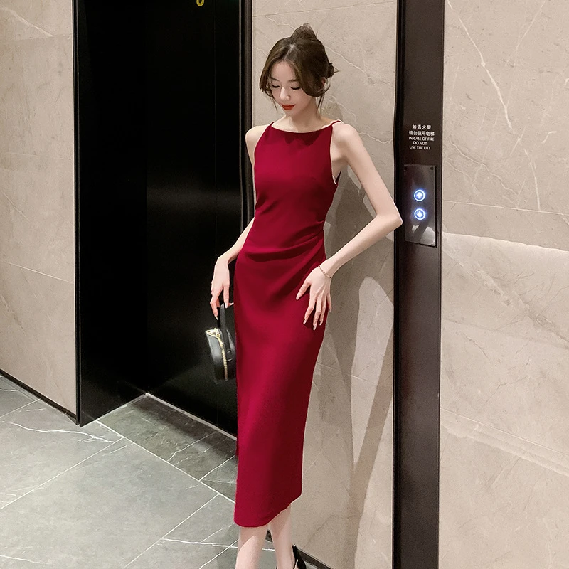 连衣裙2025夏季新款轻奢一字肩高感设计感无袖开叉修身长裙2025