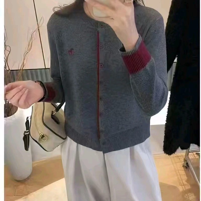 P8805100%羊毛夹色圆领开衫女士