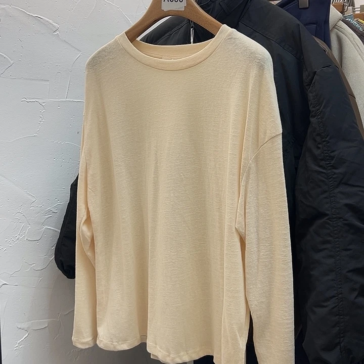 今天新款 嫩黄色长袖宽松T