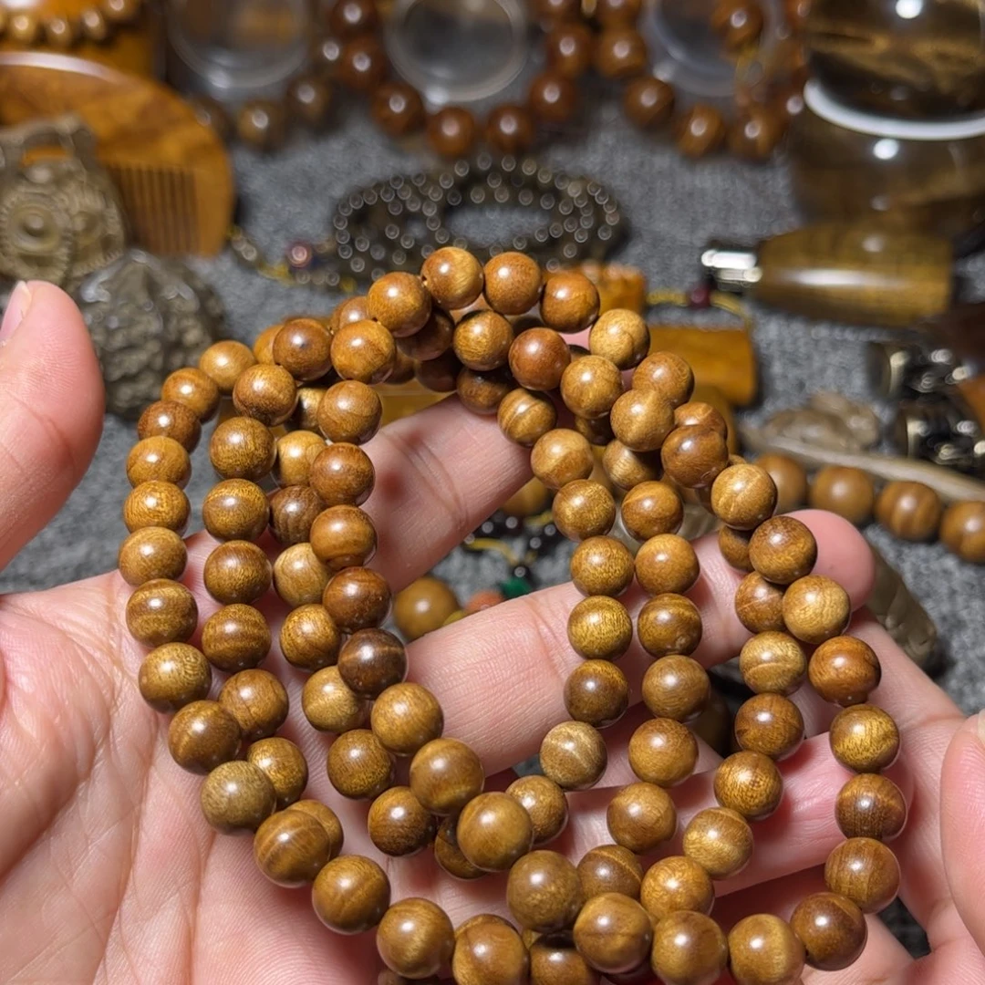 金丝楠枯木花纹佛珠0.8