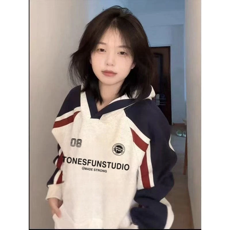 宽松型连帽长袖落肩袖卫衣情侣宽松上衣女休闲假两件韩版拼接撞色