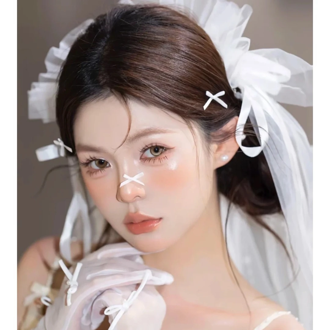 1372白色蝴蝶结头纱新娘结婚仪式小众礼服出片拍照影楼跟妆中长