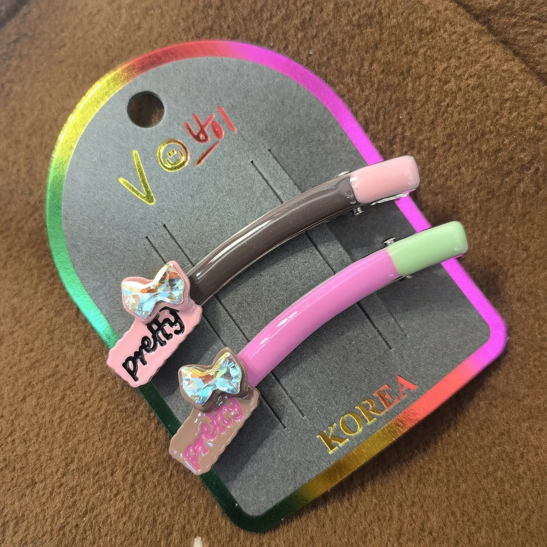 E048咖粉色蝴蝶弯型边夹一对