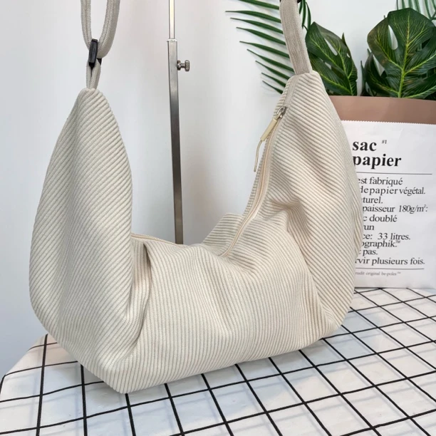 包包女2025春夏新款饺子包高级设计小众时尚通勤单肩包显瘦斜挎包