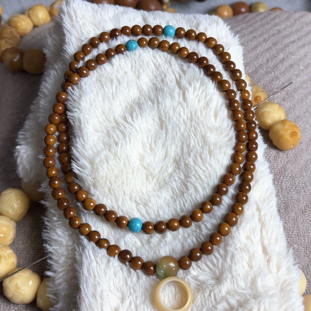 菩提根/象牙果手串蓝****族库克