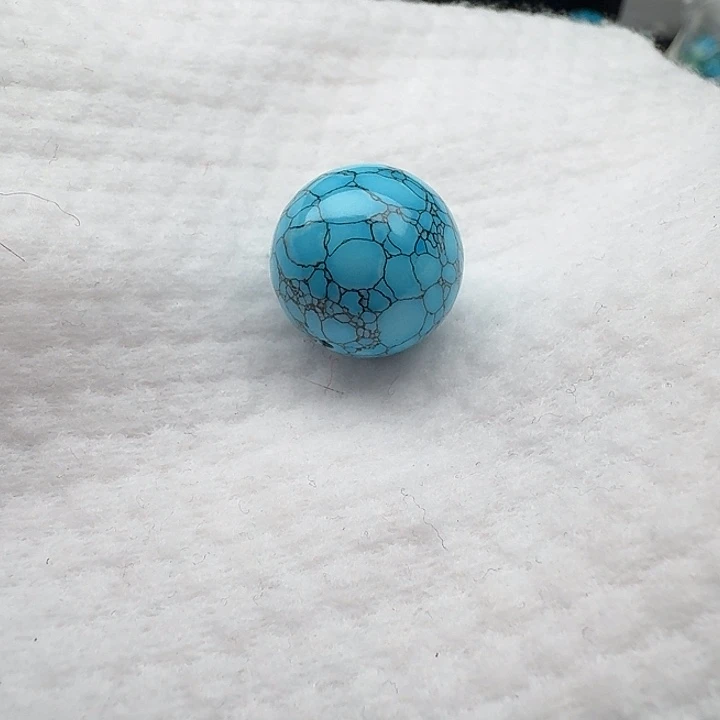 尺寸：18左右蓝网花纹圆珠一颗