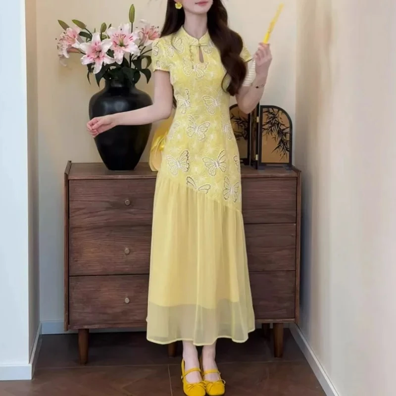 黄色蝴蝶刺绣2025夏新中式拼接蕾丝短袖包臀裙假两件气质连衣裙