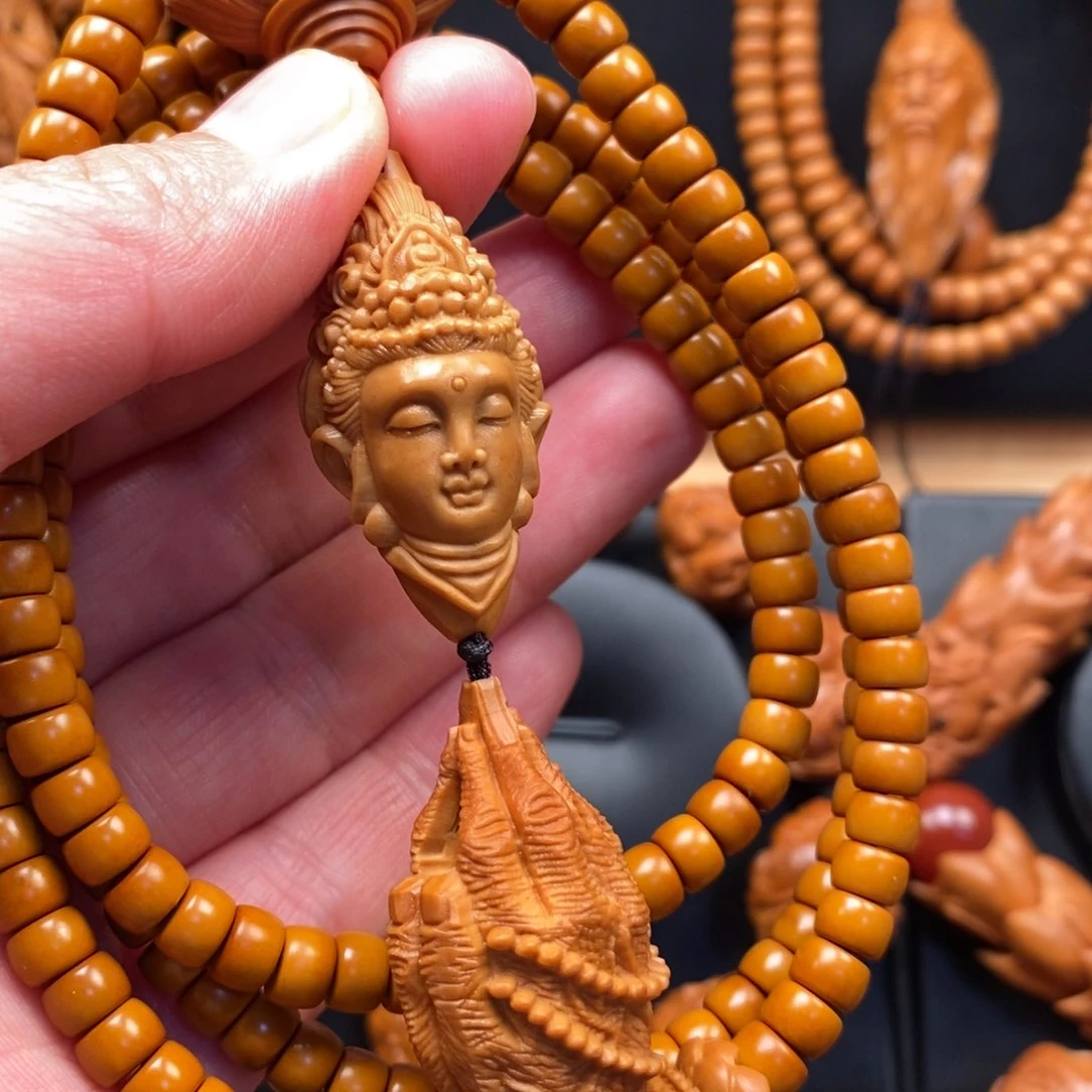 橄榄核手串观音脖挂