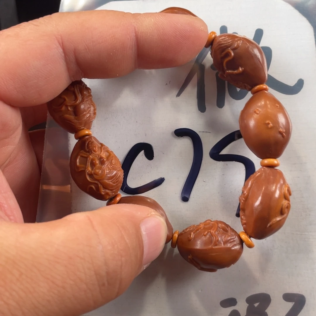 橄榄核其他橄榄核雕工艺手串 瑕疵介意勿拍