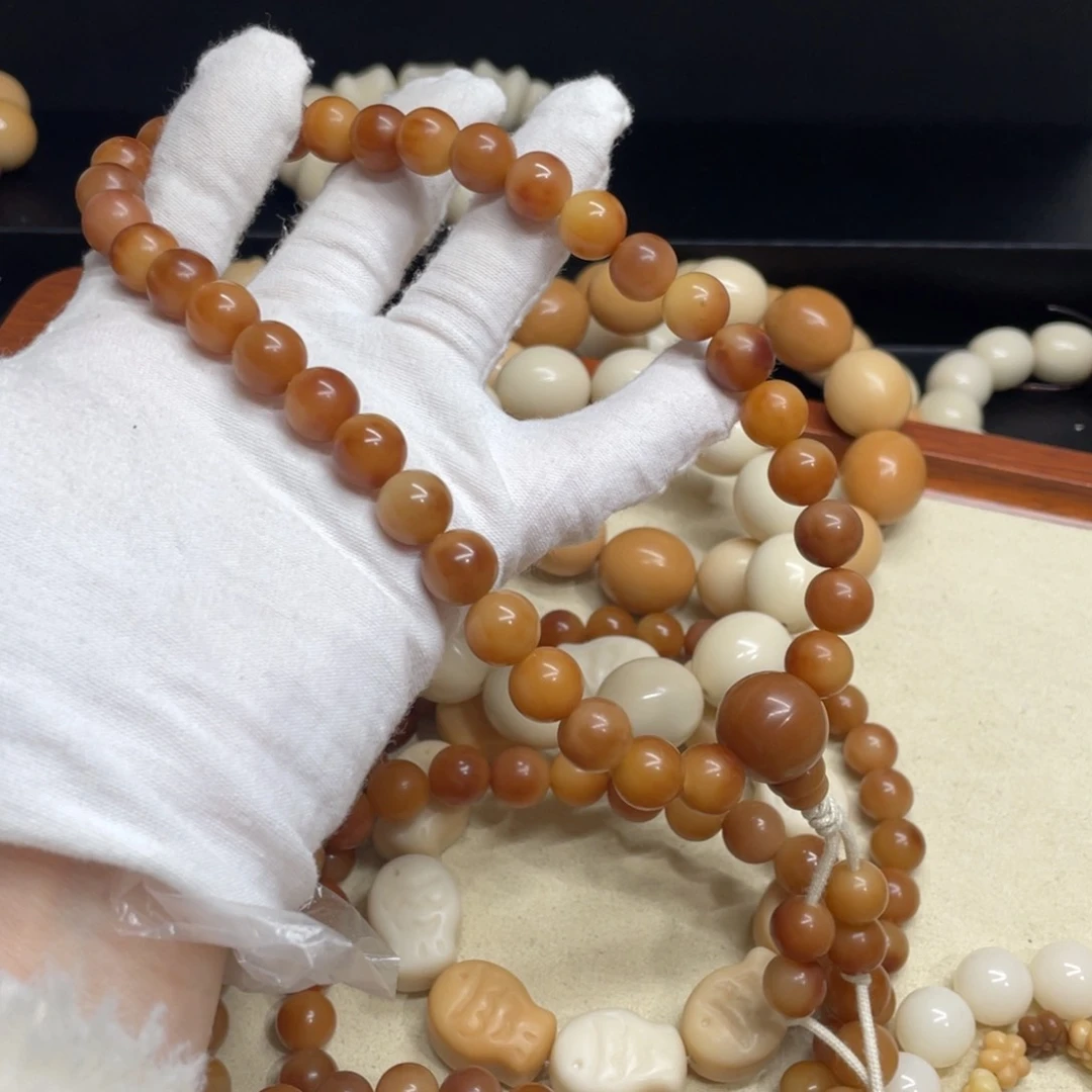 菩提根/象牙果吊坠兔*?11+干磨落地果紫皮玉化手持992