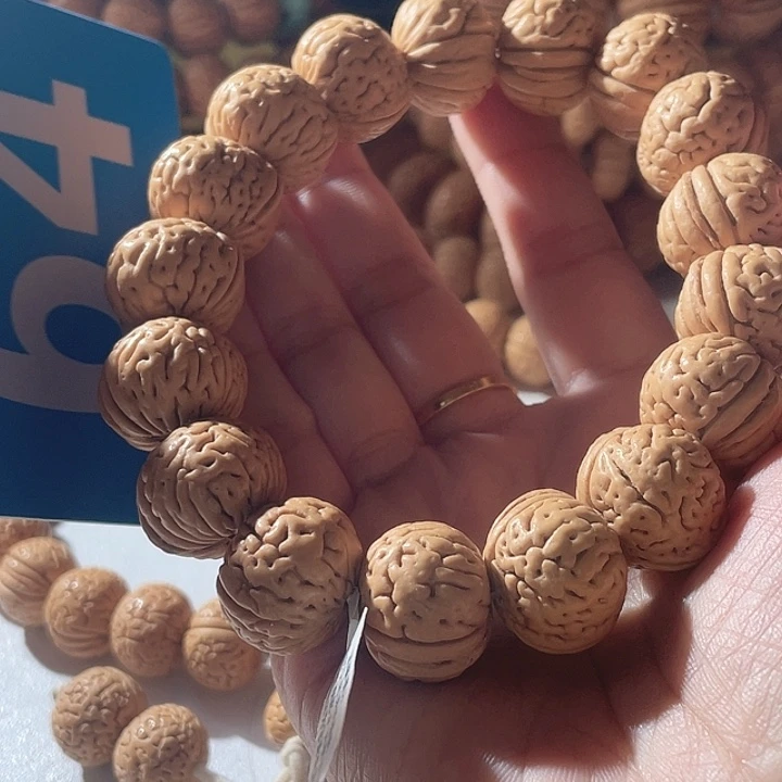 瞳***吊坠桃核桃核手串金鱼肚64