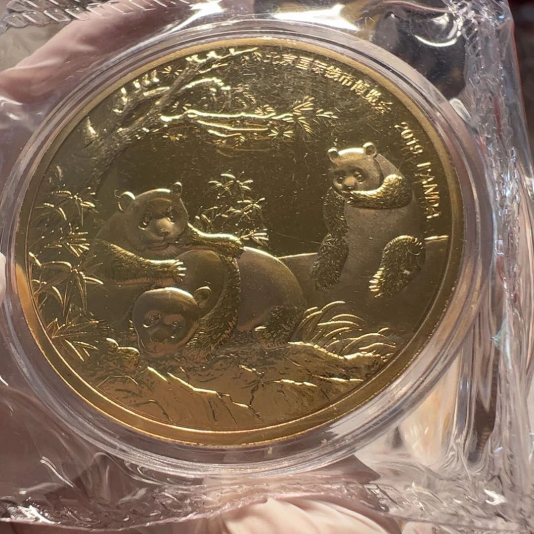 其他普通金属如图，钱币博览会熊猫1枚