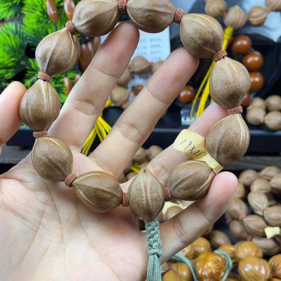 吊坠橄榄核19x26白霜红肉