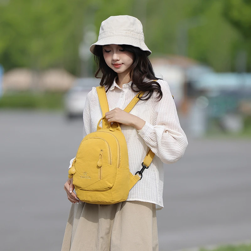 303时尚新款多功能双肩斜挎包 长23高29厚11