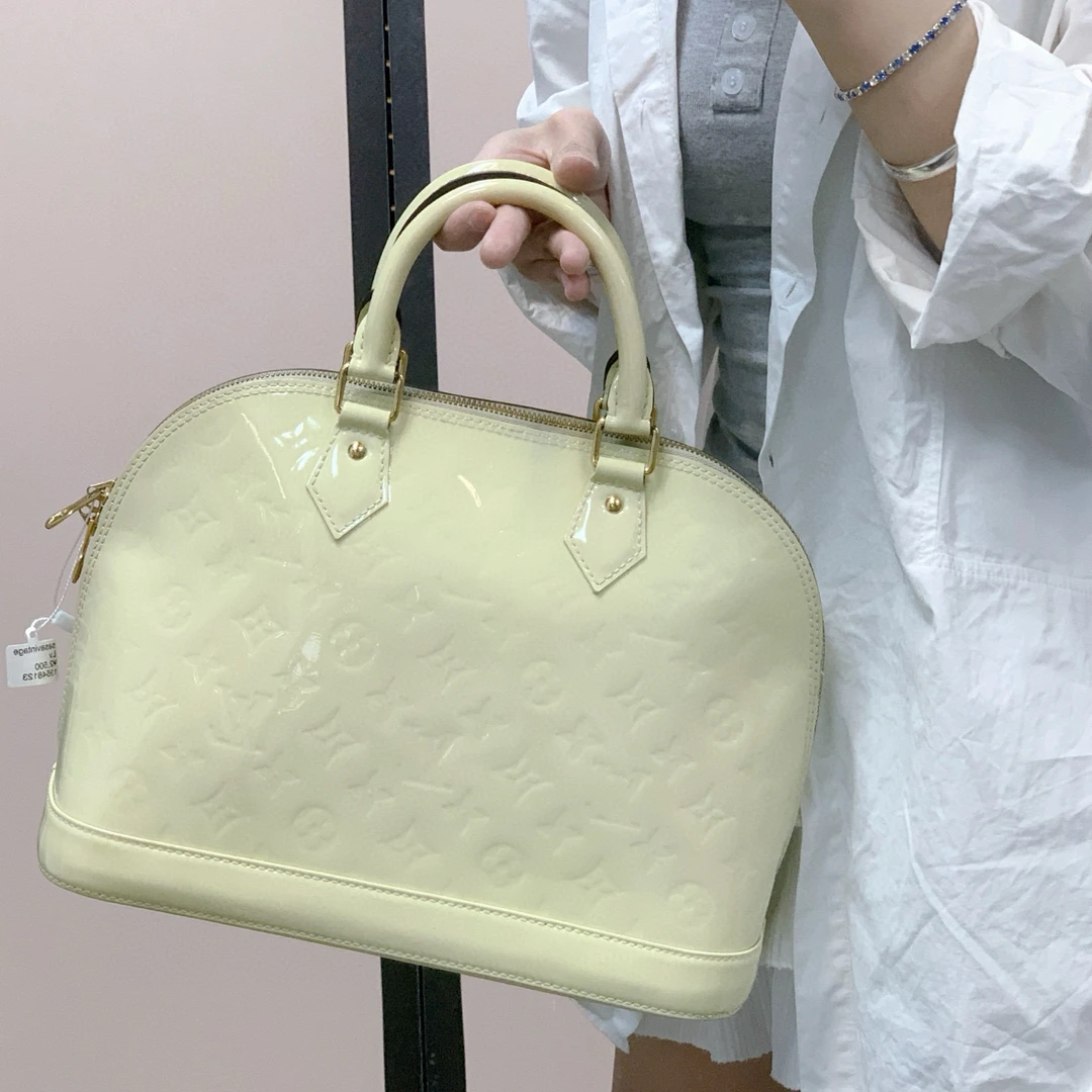 95新 LouisVuitton/路易威登 lv嫩黄色贝壳手提单肩包