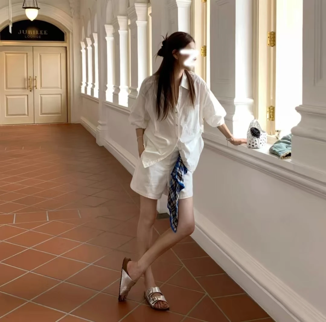 会凹造型的白衬衫秋季新款休闲百搭白色休闲翻领泡泡袖收腰衬衣女