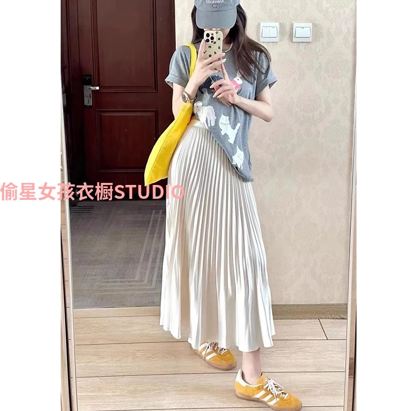 法式杏色醋酸缎面灵动半身裙女春夏高腰A字风琴褶皱纯色百搭长裙