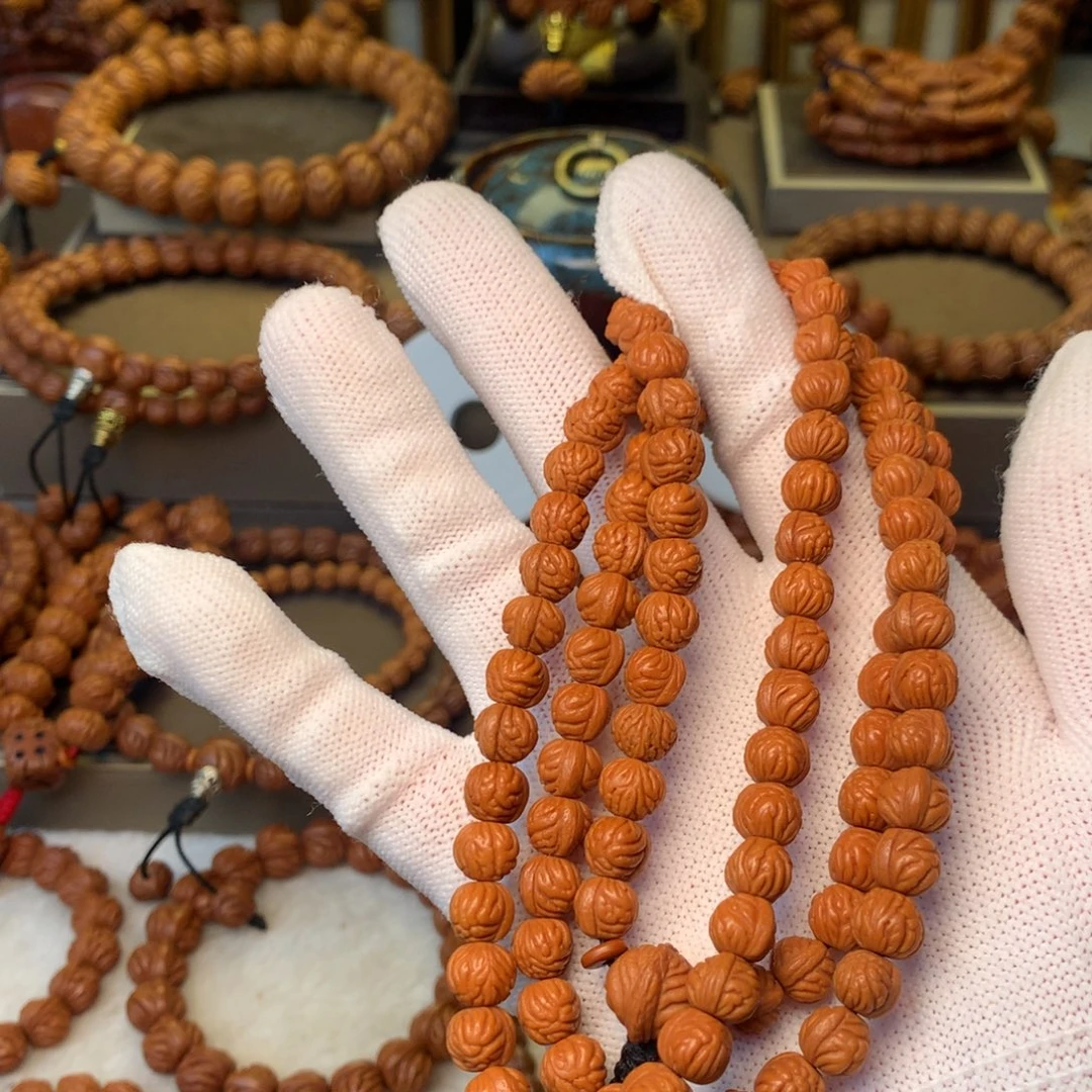 自***信手串桃核秦岭龙纹