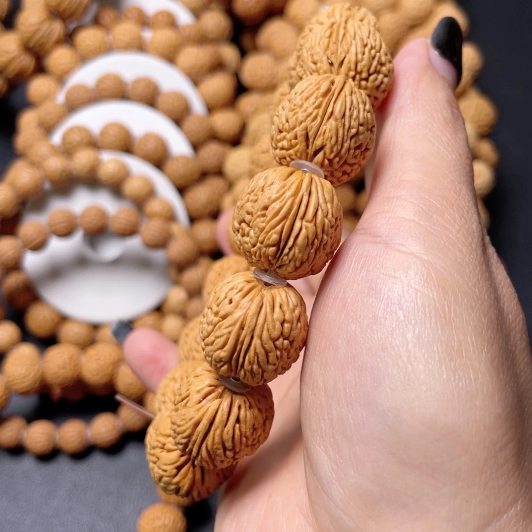 桃核手串龙鳞凤尾