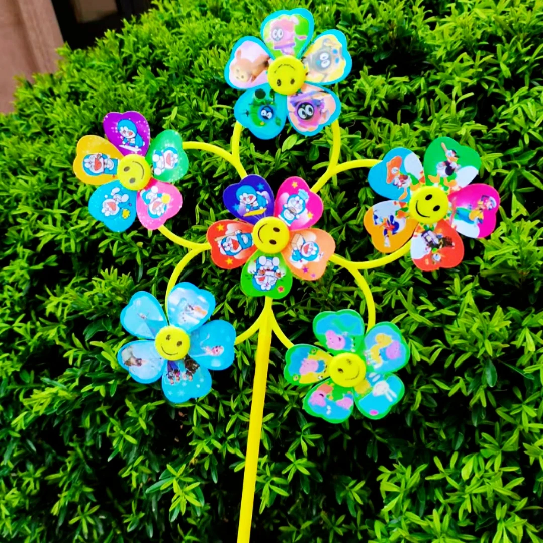 网红七彩六轮笑脸风车儿童手持卡通玩具户外装饰活动礼品公园摆摊