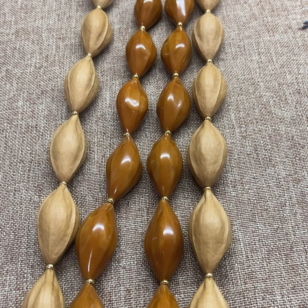 橙****猴头核桃吊坠橄榄