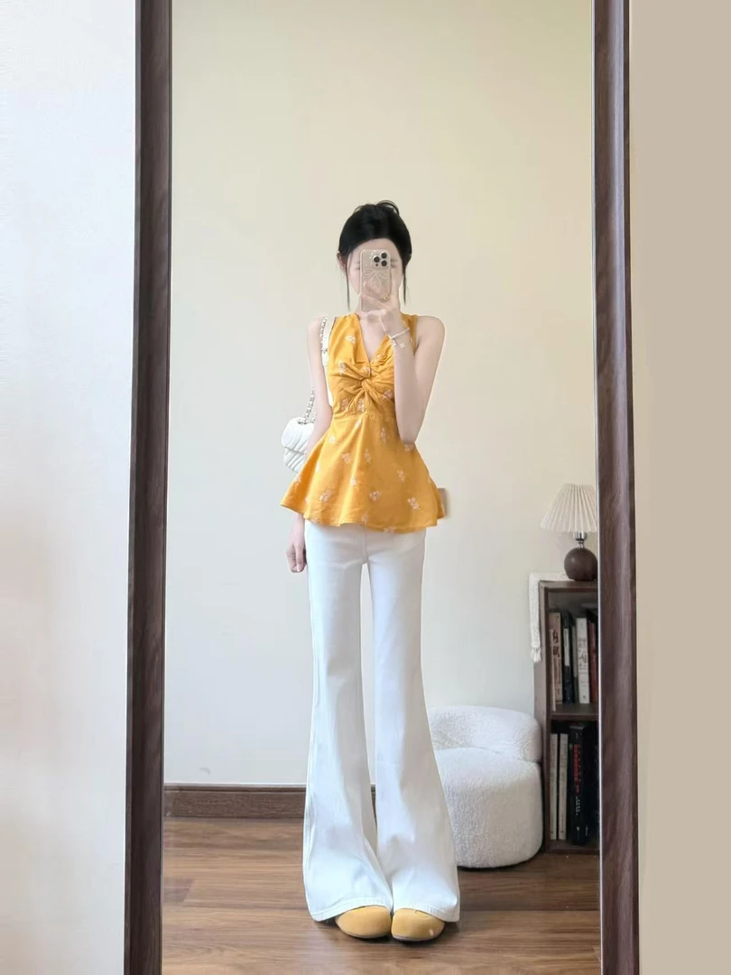 2025夏季新款黄色V领无袖挂脖吊带背心设计感扭结上衣百搭直筒裤