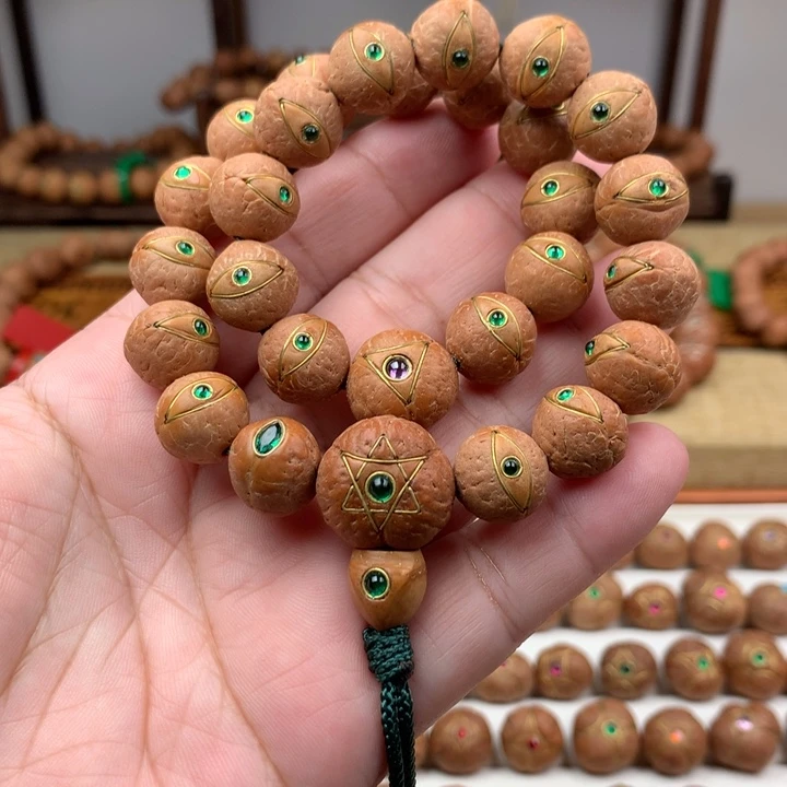 凤眼菩提吊坠手持