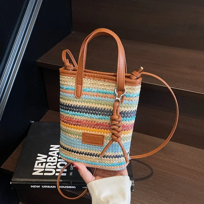海边新款编织包单肩挎季度假简约2025年韩版水桶手机草编女包包