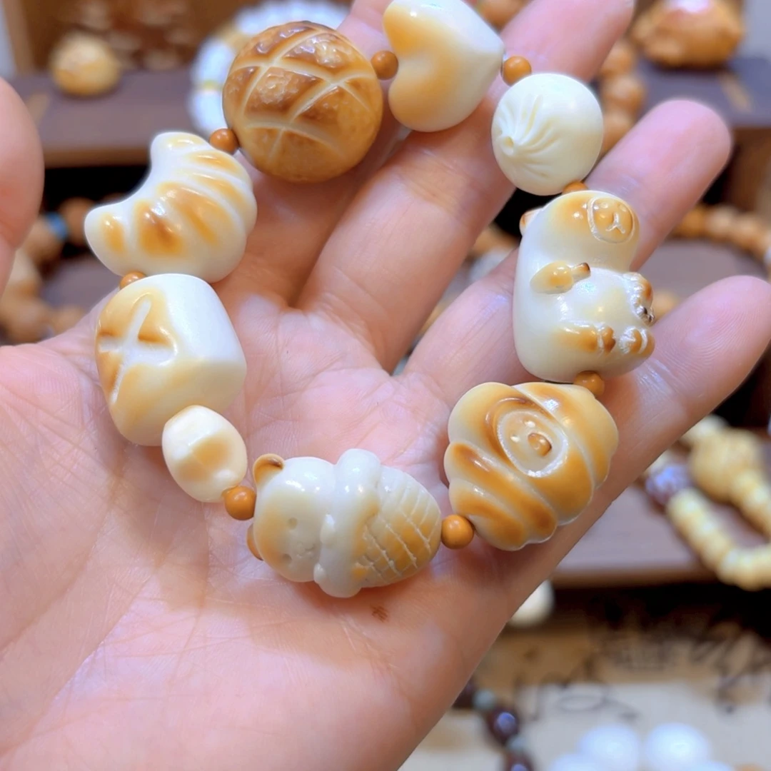 星月菩提手串象牙果多宝手串量拍