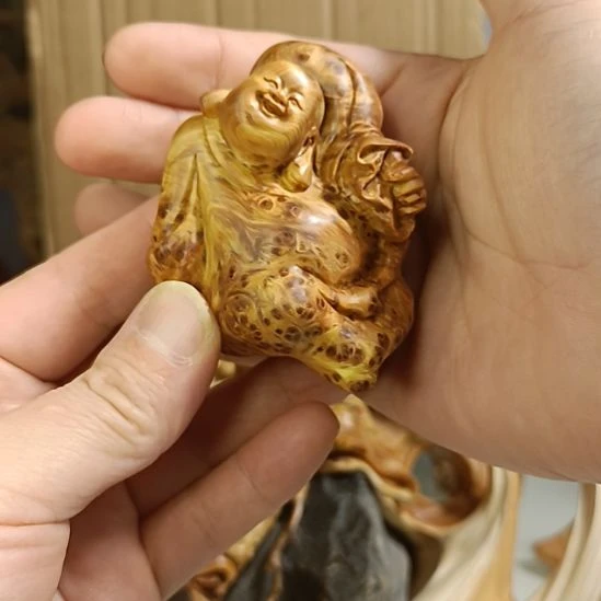 修***儿柏木（崖柏）手把件笑佛