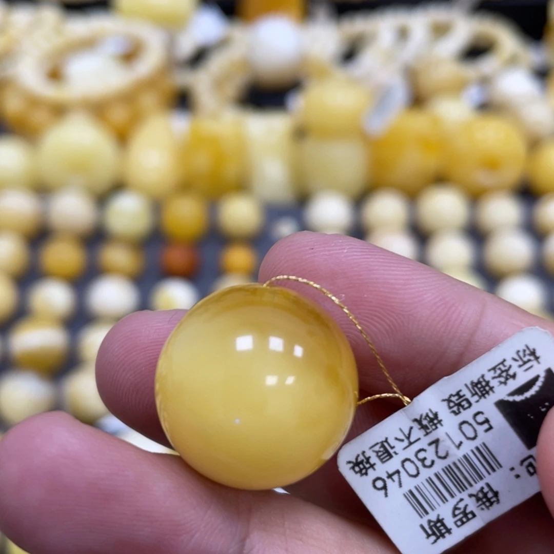 蜜蜡未镶嵌裸石19.6mm瑕