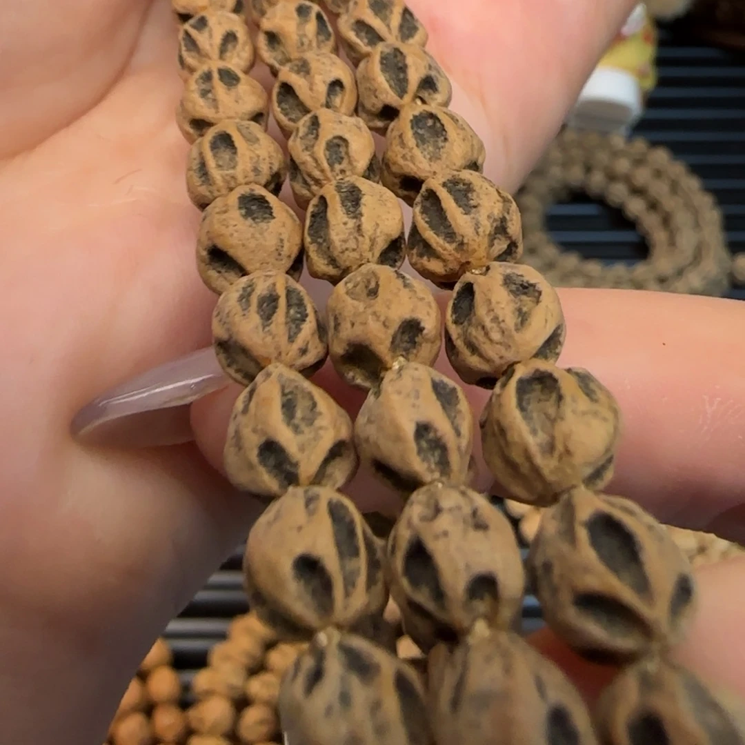 被***嘴柏香籽/百香籽吊坠