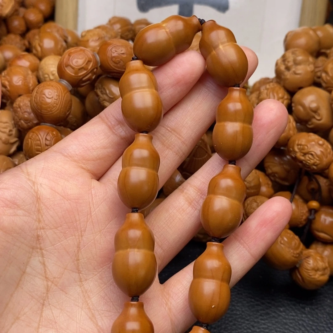 橄榄核吊坠胡芦手串
