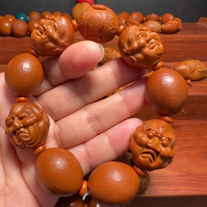 手串橄榄核喜怒哀乐