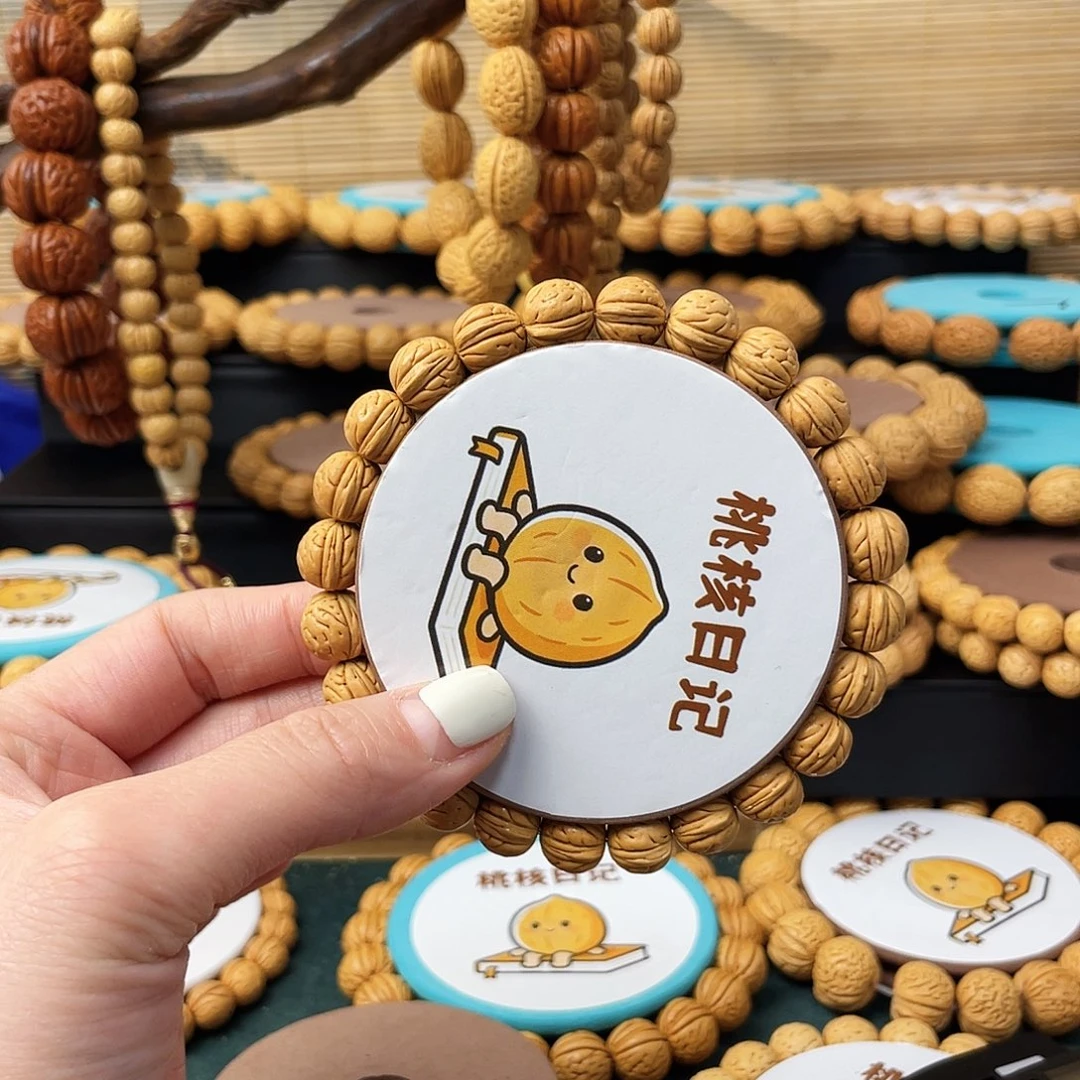 话***.桃核手串野生金豆