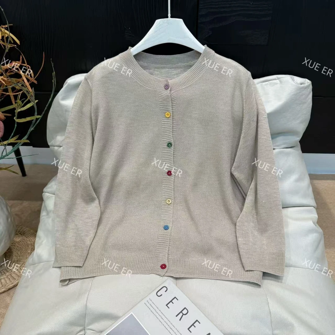 雪儿X00068夏款工艺双面针宽松版彩虹扣九分袖冰凉感针织开衫上衣