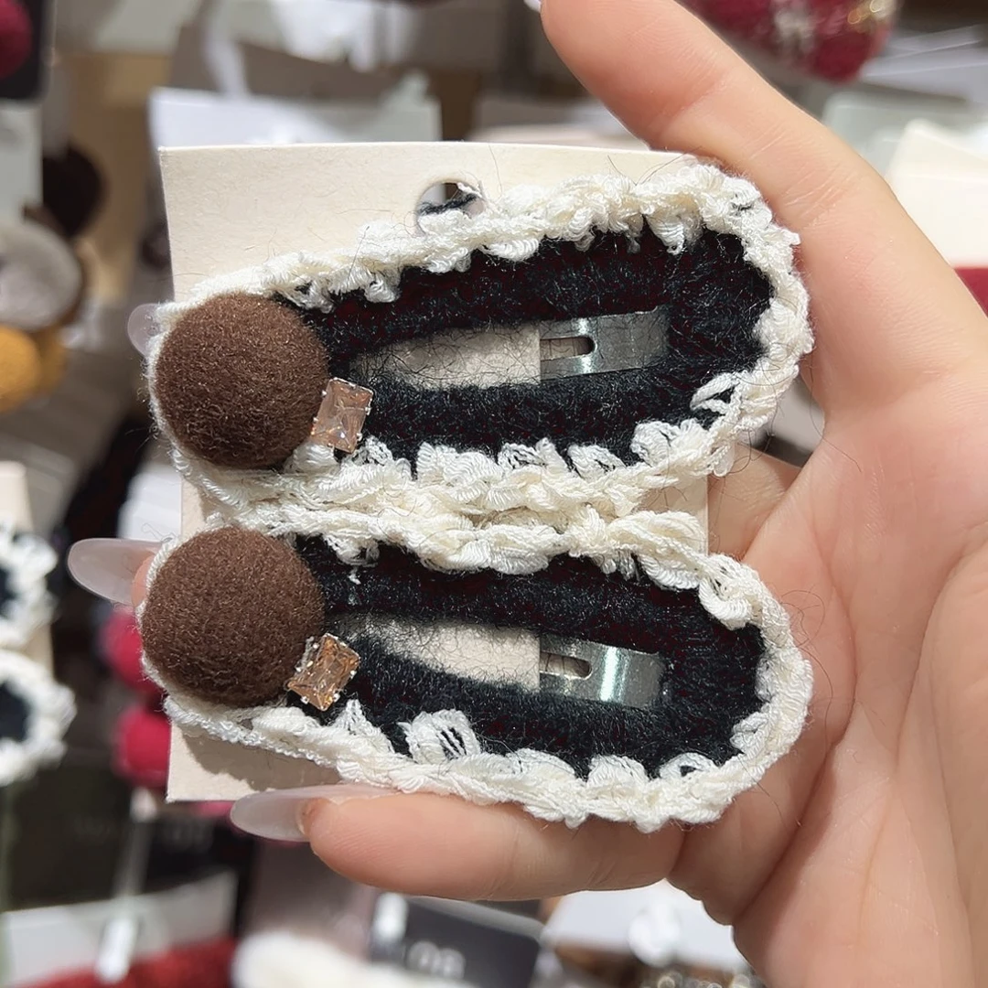 羽毛不锈钢黑色椭圆拜拜夹