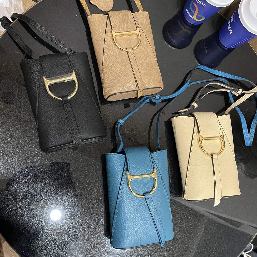 迪桑头层牛皮手机包