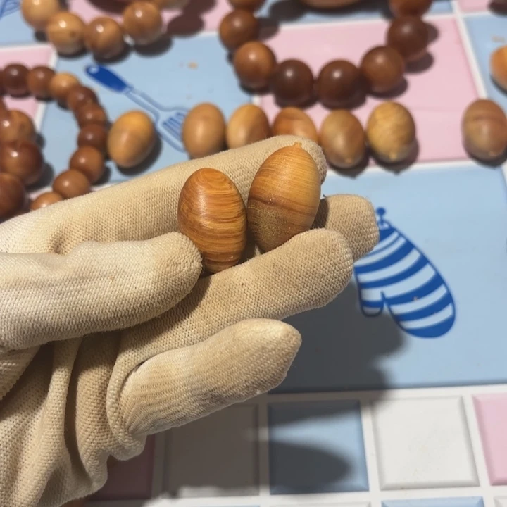 釋***修木质类橄榄珠俩颗毛坯