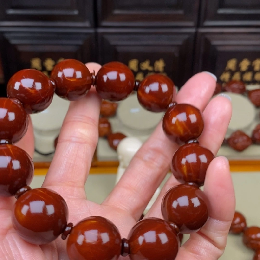 老***赵橄榄核吊坠四花光珠