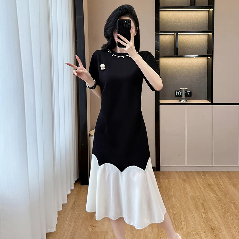 新款高级感拼接宽松腰假两件连衣裙夏季实拍荷叶边设计感大码女装