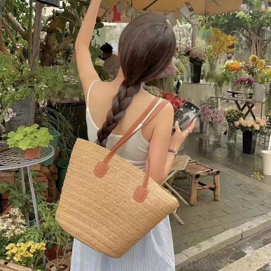 夏天出游大容量编织包包2025新款休闲度假风沙滩包通勤百搭草编包