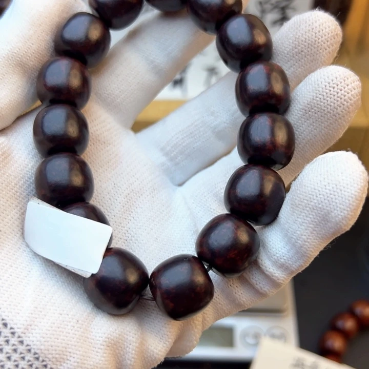 木崔*善海南红降黑金满纹1.5老型珠15颗满留疤