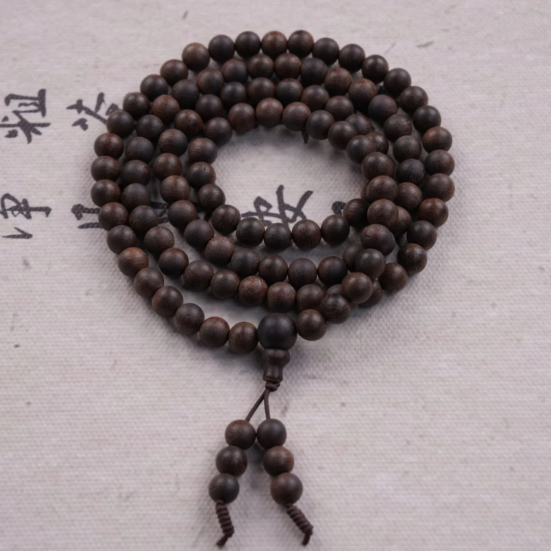 沉香木 【木丙】Z030海南 沉 水 沉 香树心油0.6多圈圆珠手串